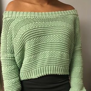 Cropped green knit sweater